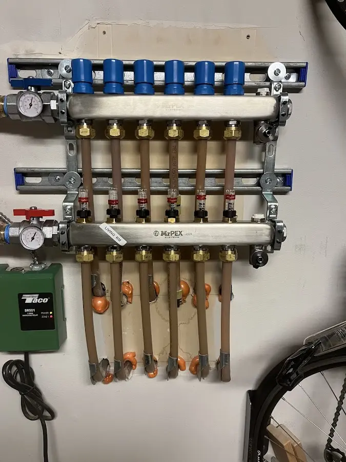 Plumber performing Water Heater Repair at a residential property in North Fort Lewis